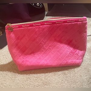 Hot pink juicy couture wedge makeup bag with logo print in soft velvet material